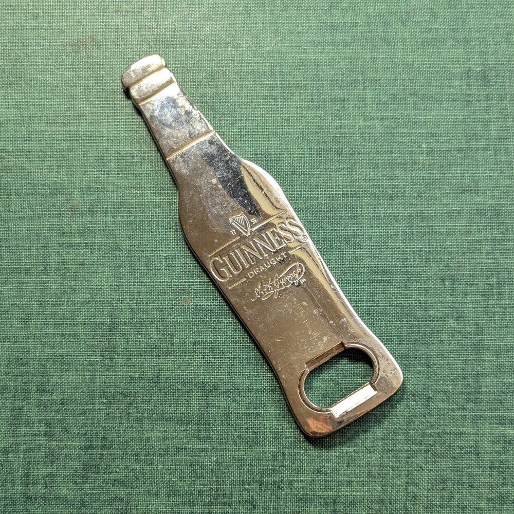 Flat metal Guinness bottle opener